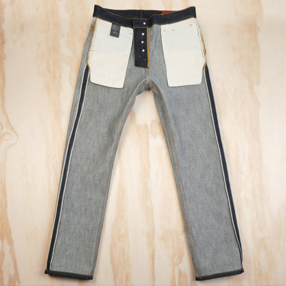 Inside-front view of the jeans showing cotton pocket bags and enclosed seams.